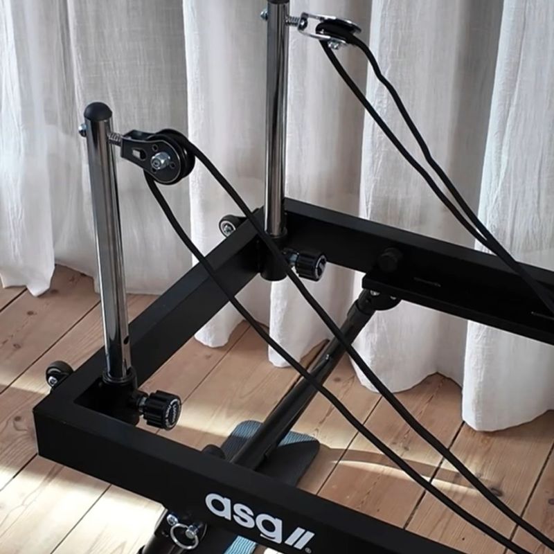 Reformer pilates maskinens wire-system